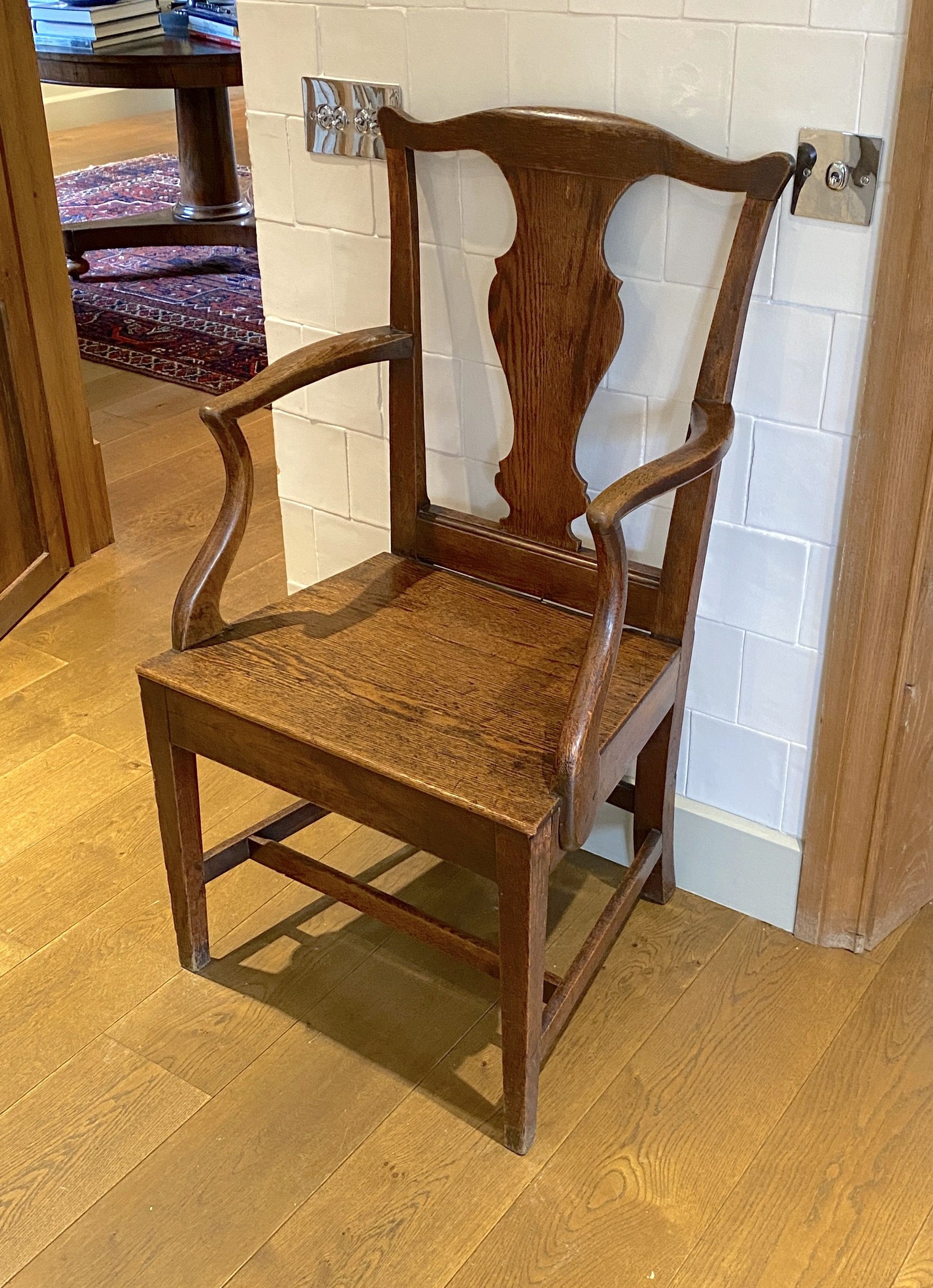 A George III oak cottage dining chair, with solid splat and seat